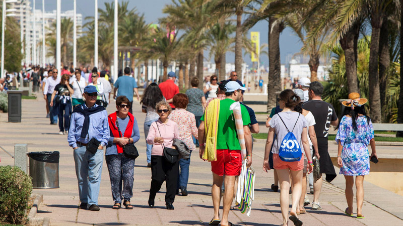 People walking on Gandia's promenade sea
