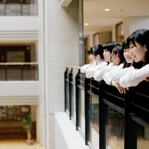Japanese schoolgirls, on the first floor, overlooking the atrium.